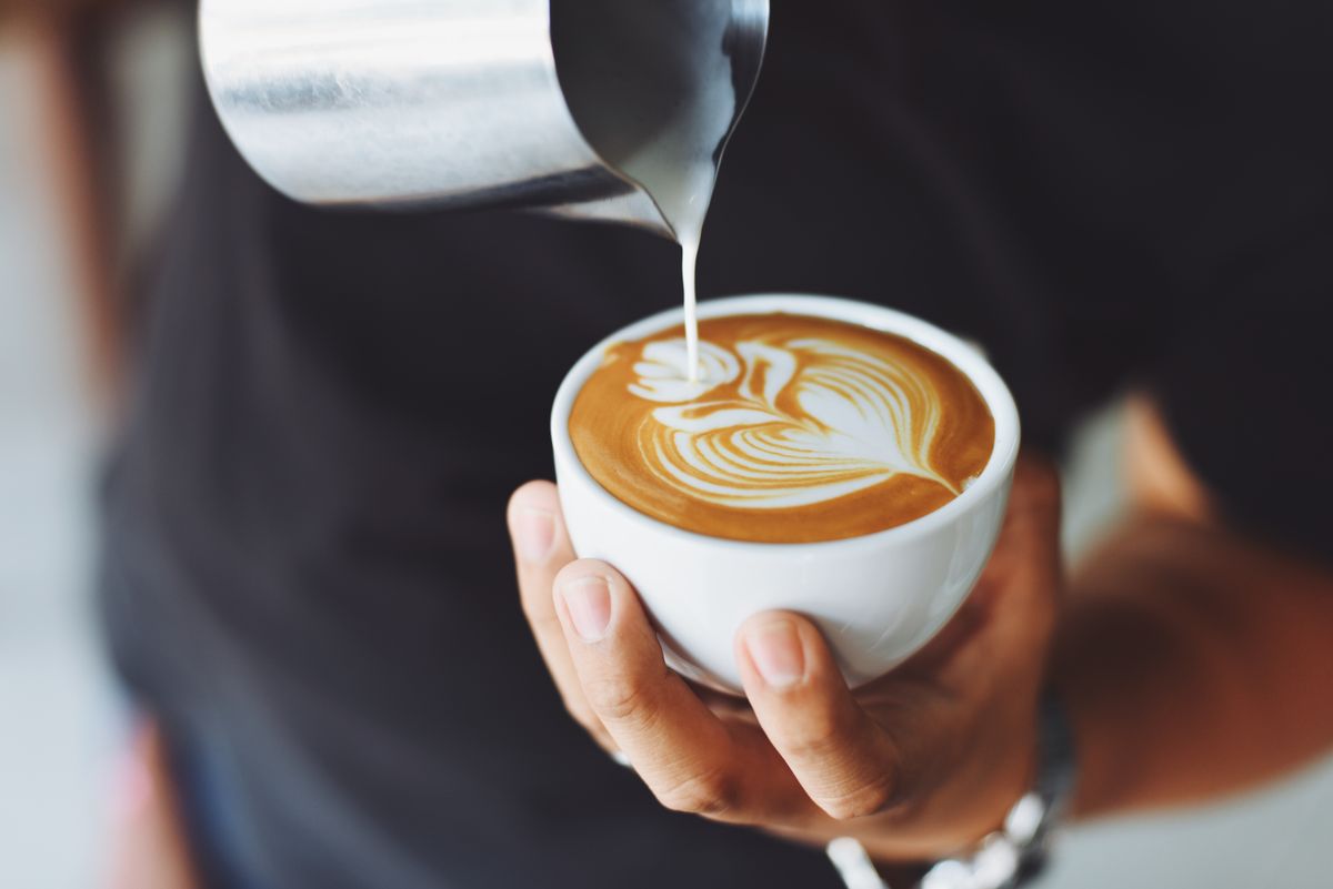Close view of kopi steam rising from a cup