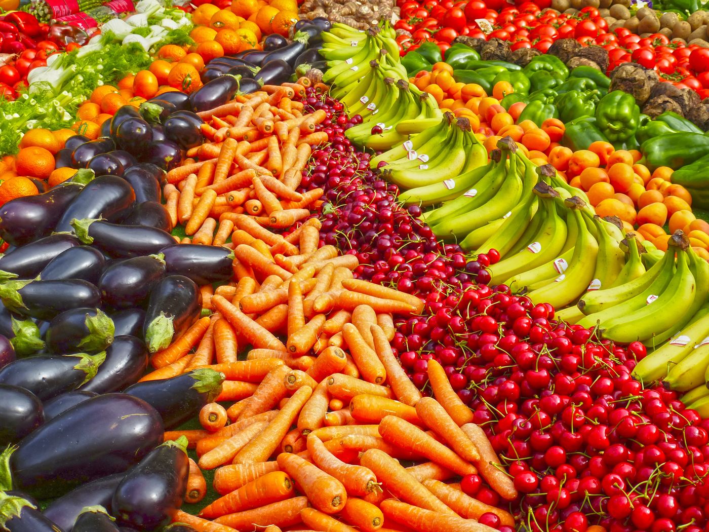 Colourful fruit stalls at a wet market